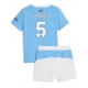 Maillot de foot Manchester City John Stones #5 Domicile vêtements enfant 2025-26 Manches Courtes (+ pantalon court)